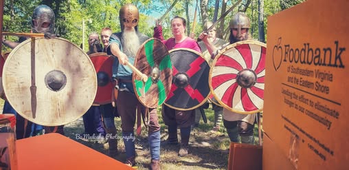 SAVGR Pointing at the Food Bank Donations